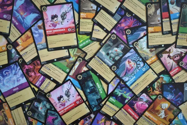 Disney Lorcana cards spread out on a table