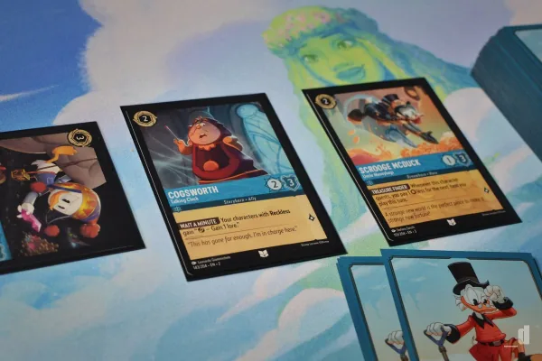 Close-up of Disney Lorcana cards on a tournament playmat